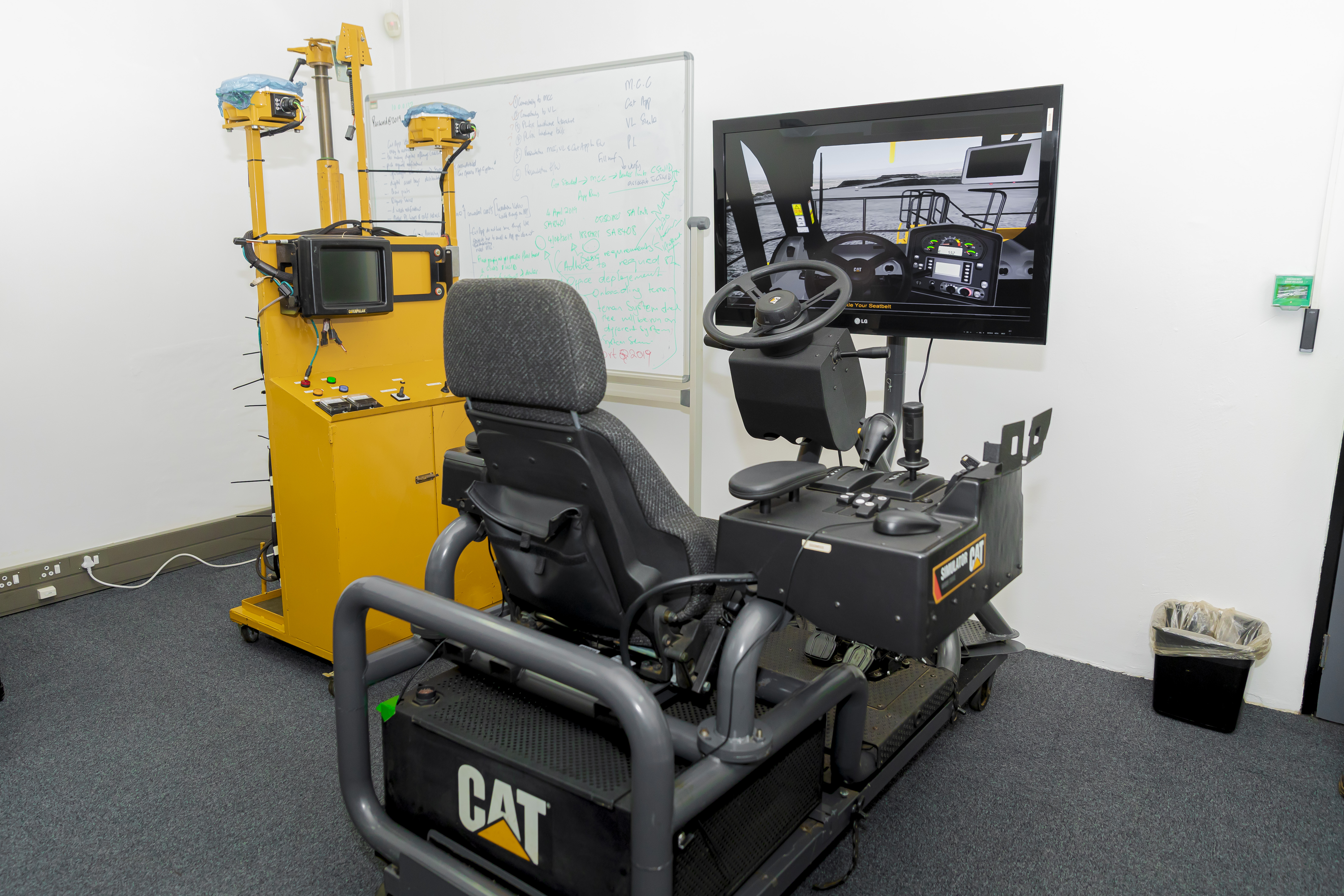 CAT machine simulator for operator training